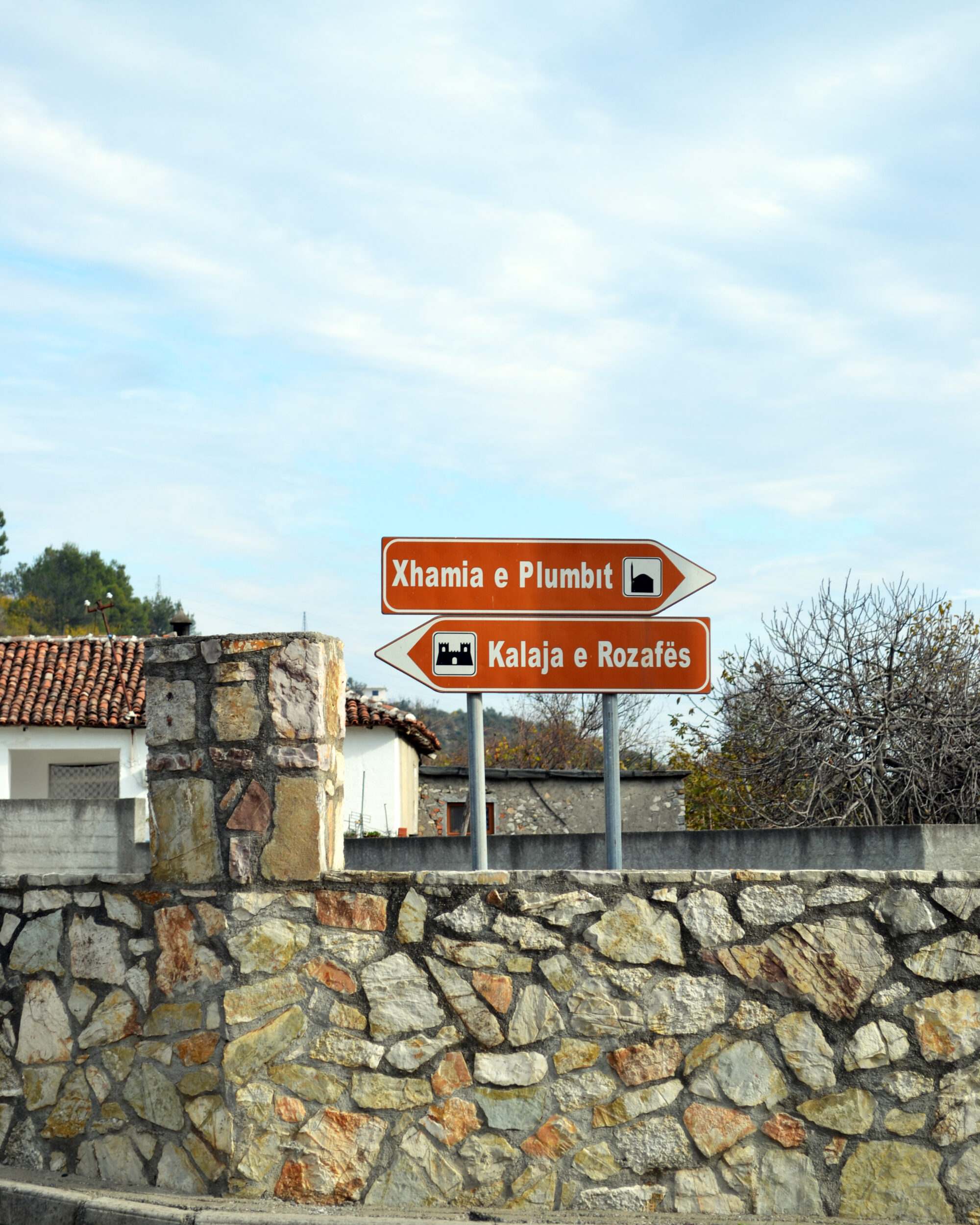 Directional signs to the Lead Mosque and Rozafa Castle in Albania.