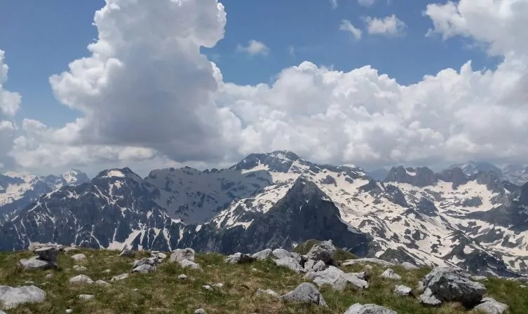 Panoramic view from Maja e Rosit in autumn fog