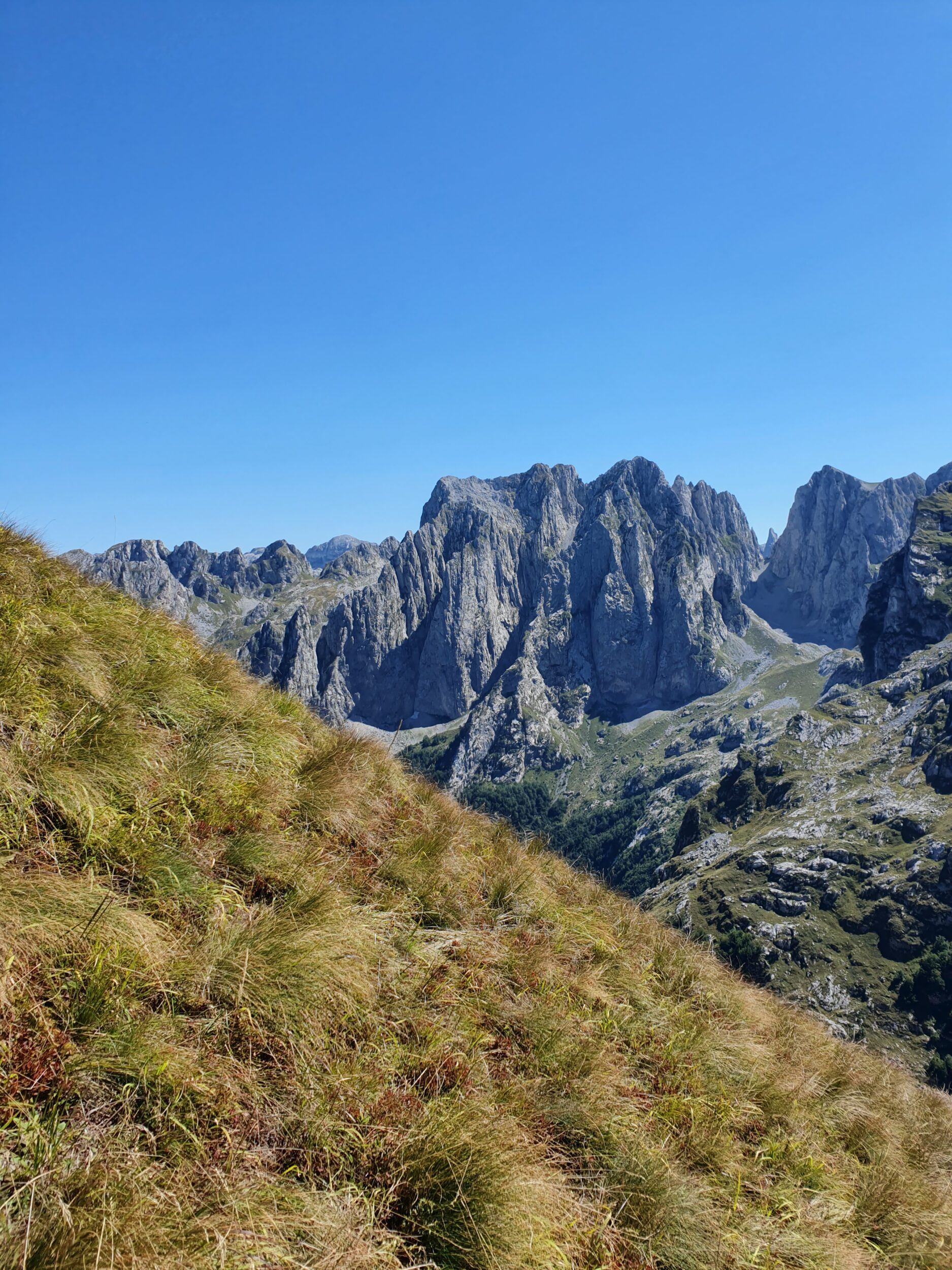 Alpine hike through autumn meadows at Maja e Vajushës