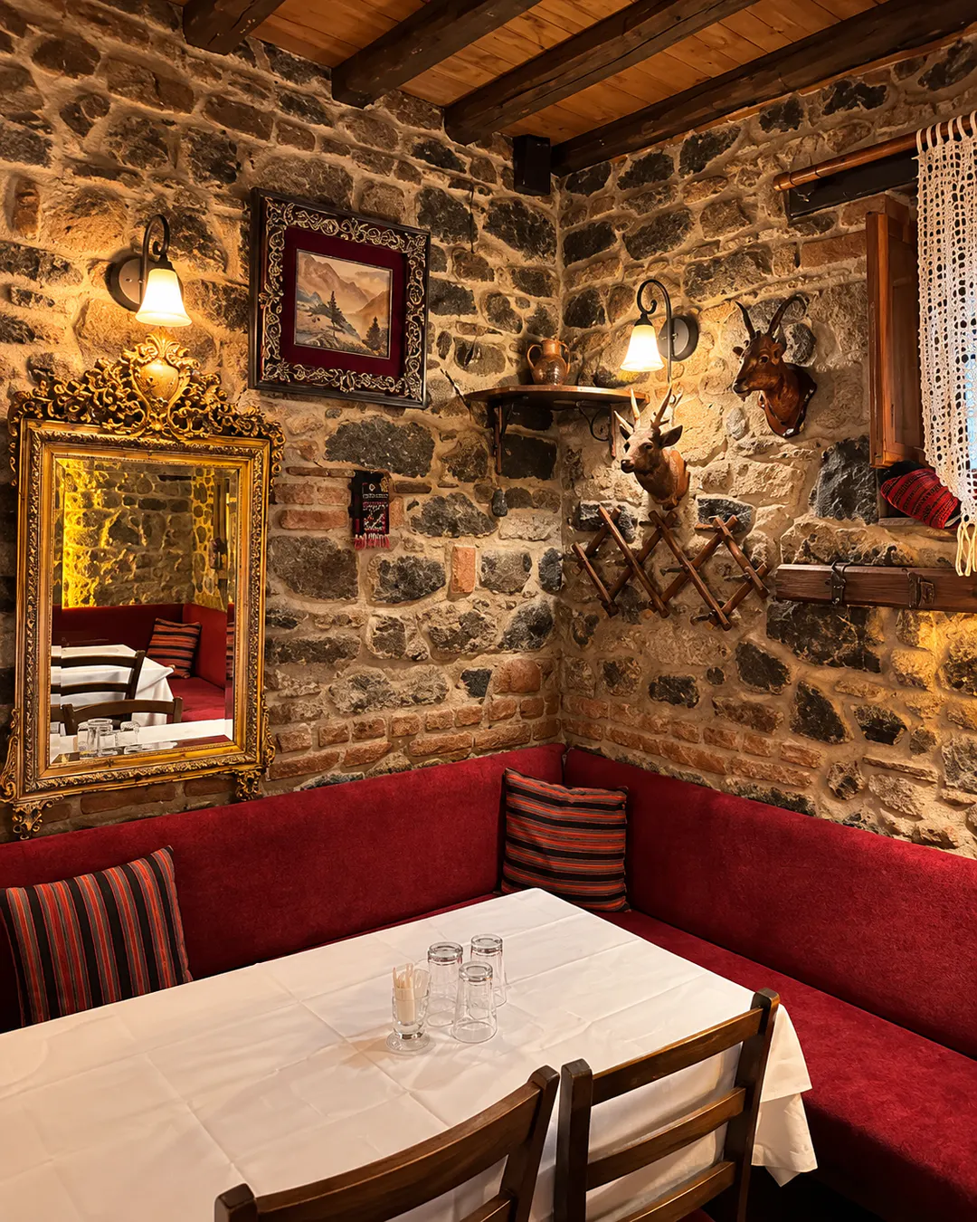 Traditional interior of Vila Cofiel restaurant in Korca