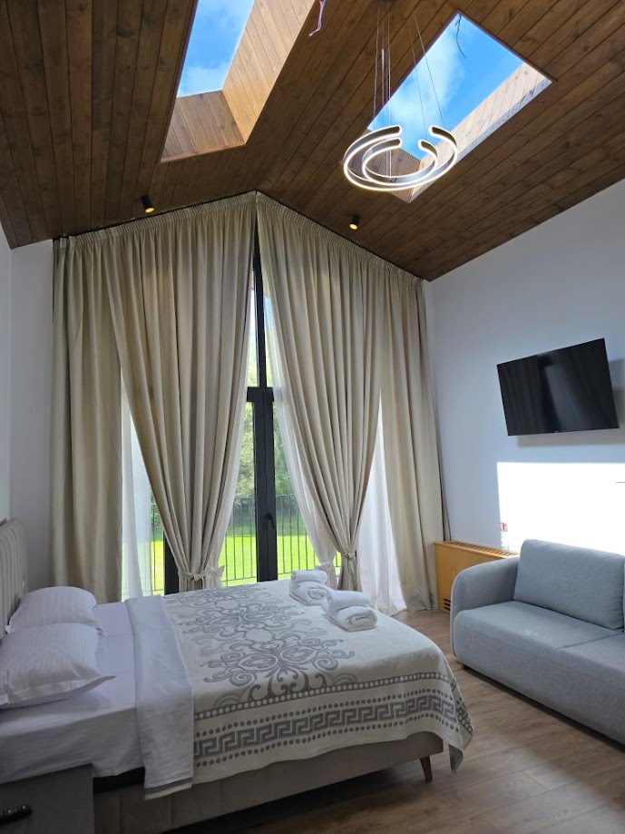 Comfortable guest rooms at Toska Farm surrounded by nature in Divjake