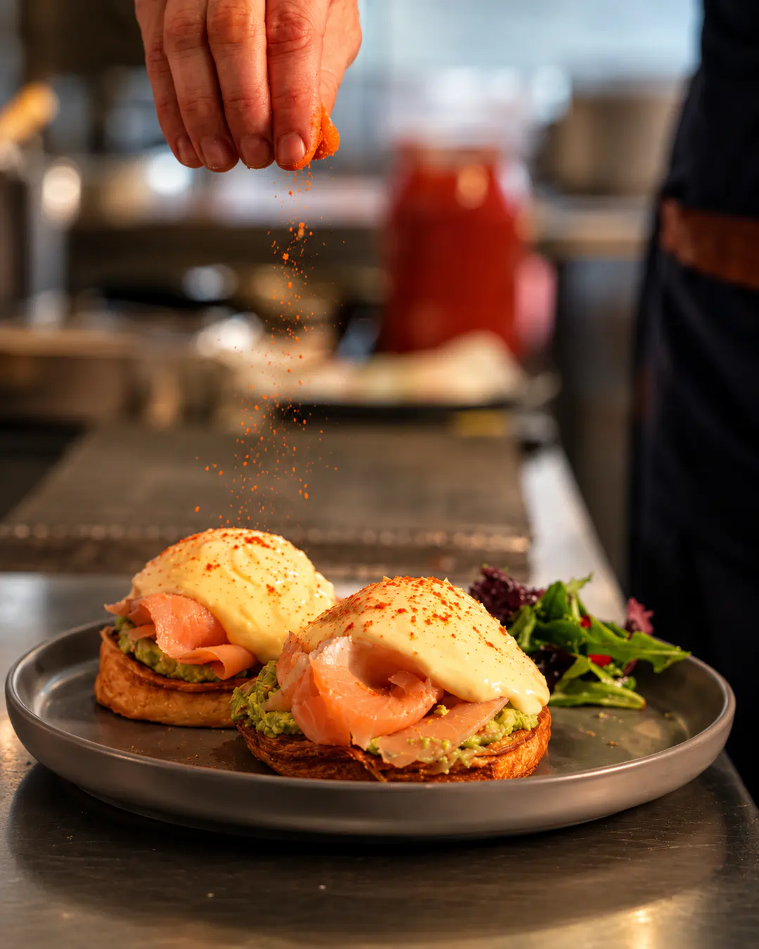 Eggs Benedict with smoked salmon and avocado at Delibros in Tirana