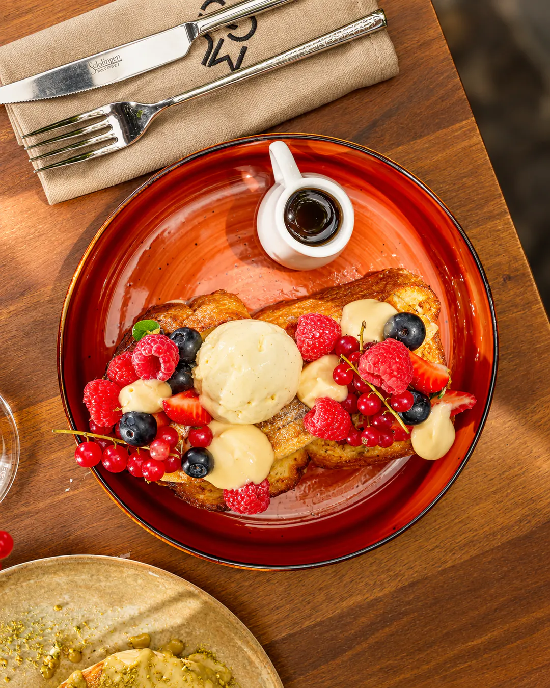 French toast with berries and ice cream for brunch at MUGO Tirana