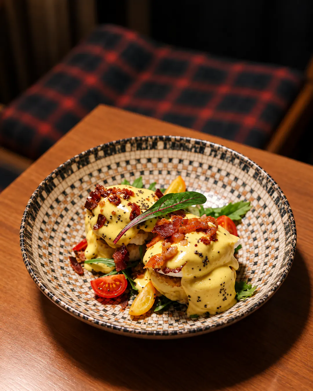 Eggs Benedict with bacon at Noor Coffee & Fine Food in Tirana