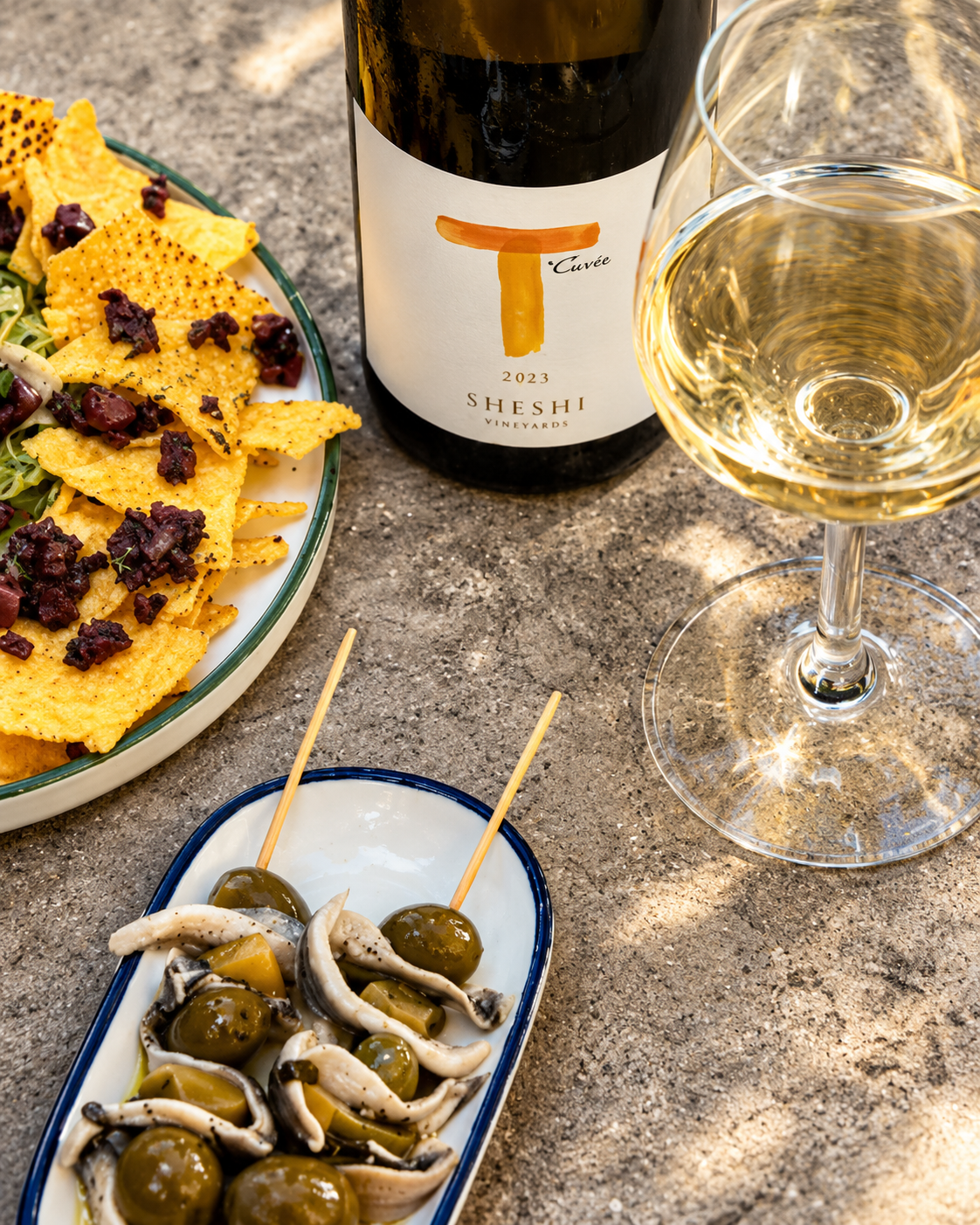 White wine paired with Mediterranean tapas at Vesper Wine & Tapas Bar in Tirana
