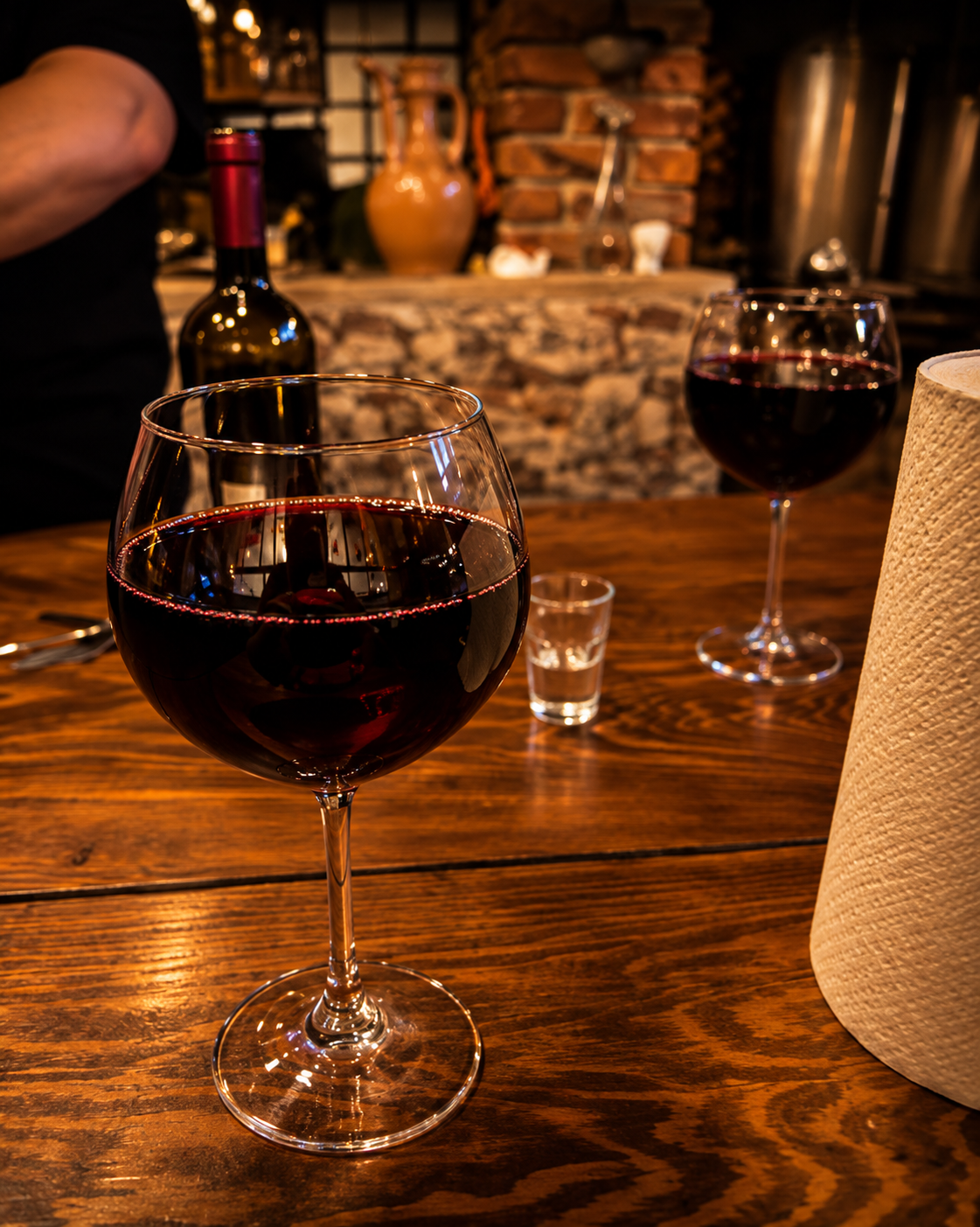 Glass of red wine during a wine tasting experience at Kantina Binjakët in Tirana