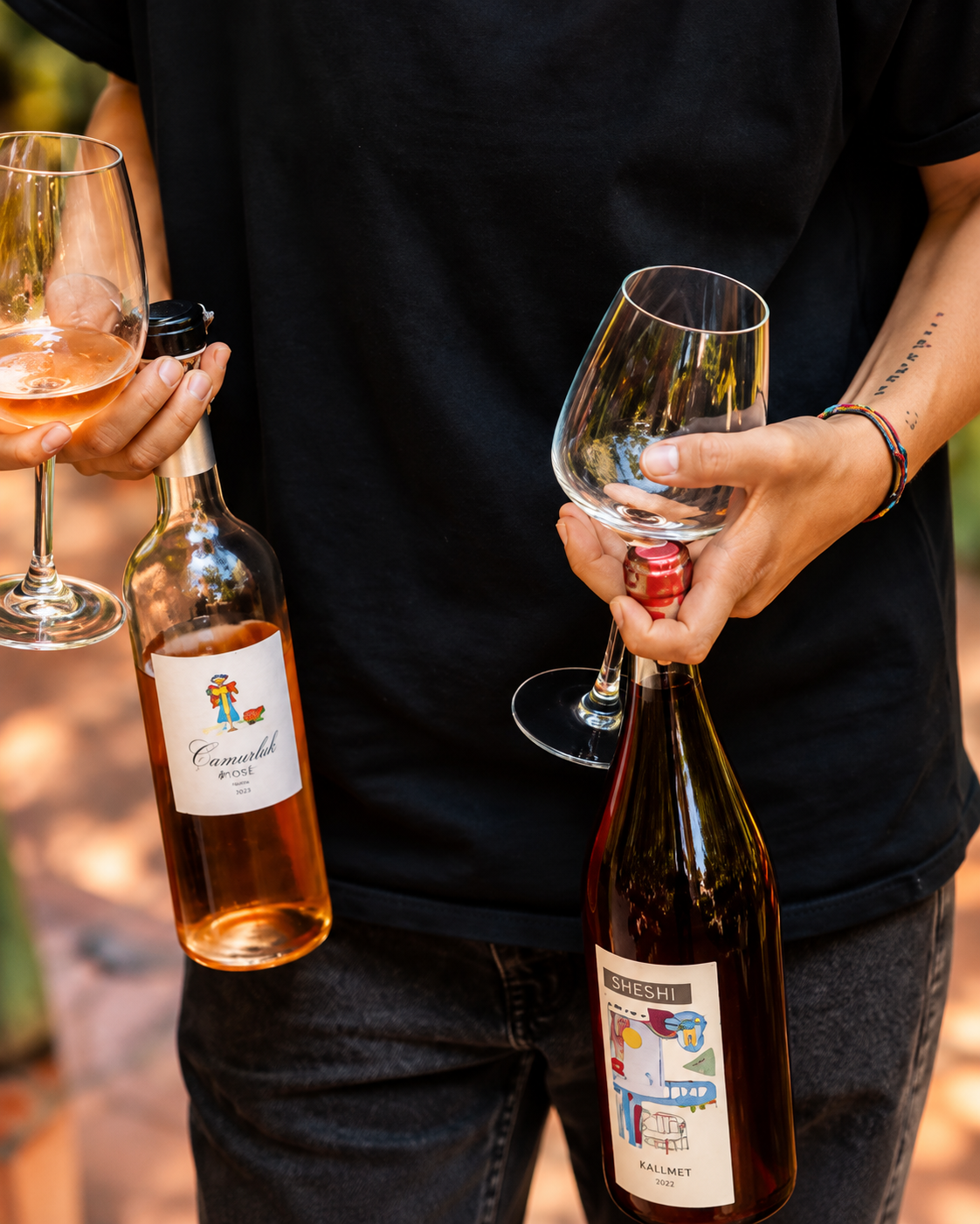 Wine bottles and glasses being served at Bufe Wine Bar in Tirana