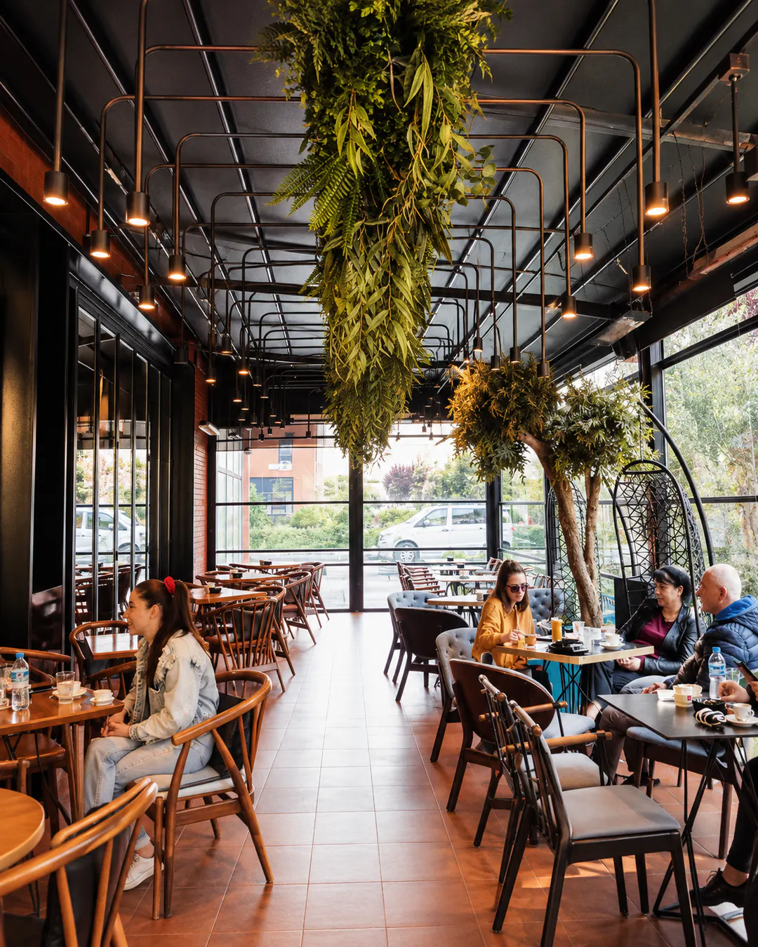 Modern interior and seating at Cafe Momus in Tirana