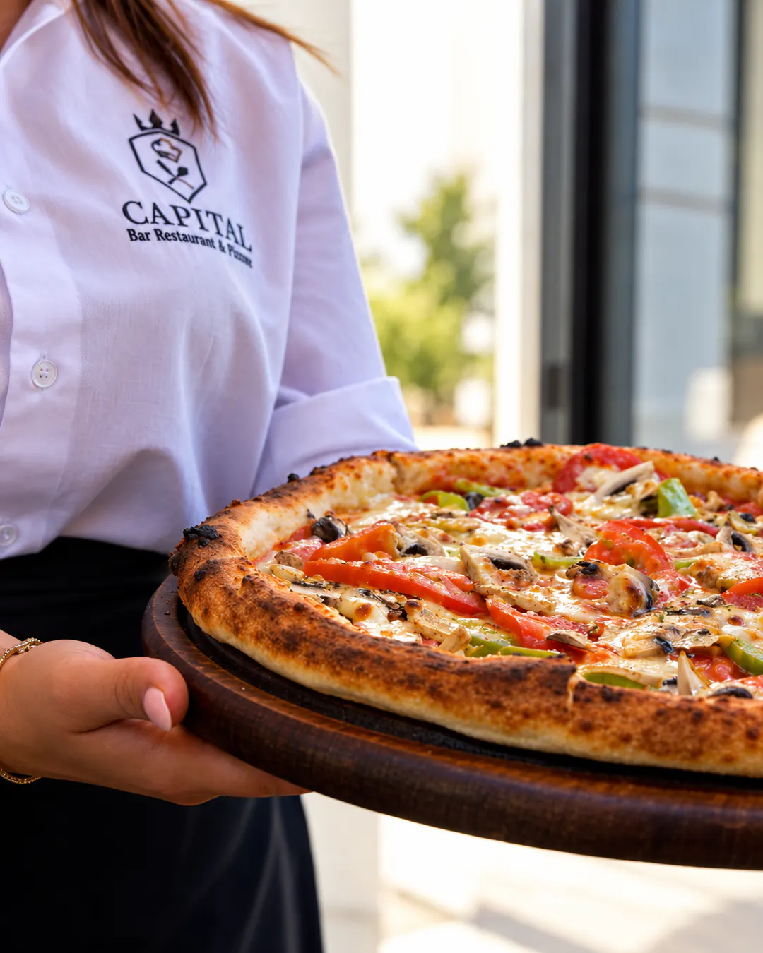 Italian-style pizza at Capital Restaurant Piceri in Tirana, Albania