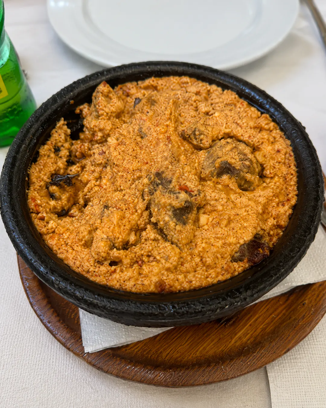 Traditional tavë dheu at Oda's Garden in Tirana