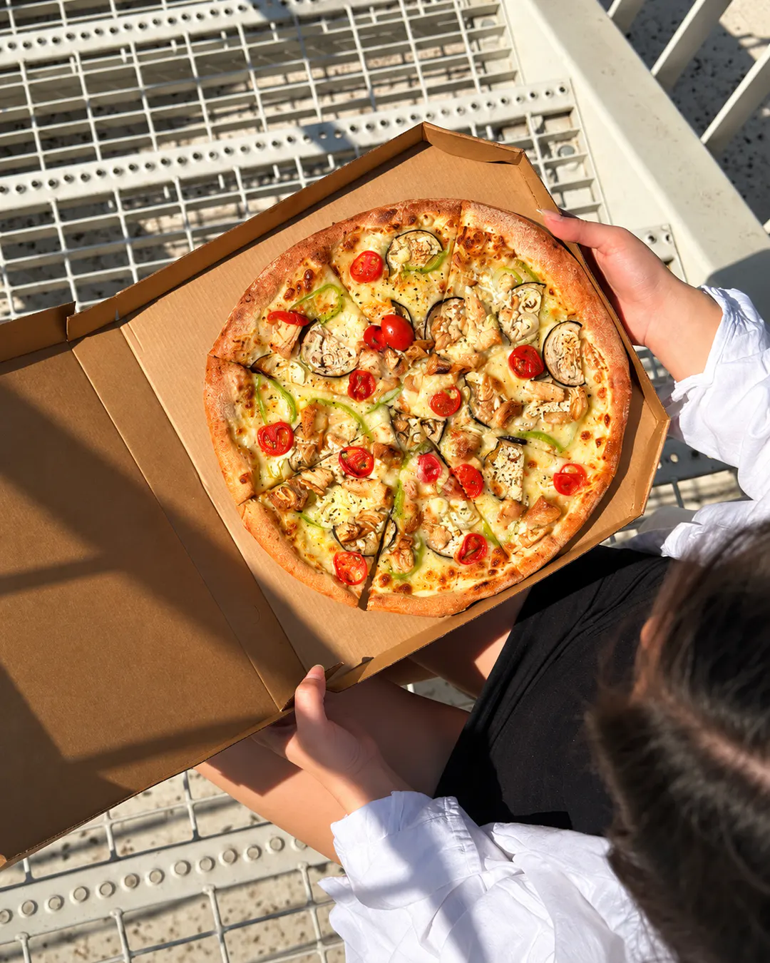 Italian-style pizza at Pizza Inn in Tirana, Albania