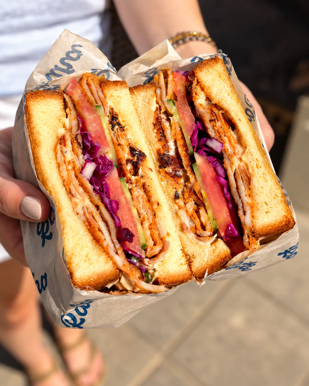 Kebab sandwich with chicken, tomato and red cabbage at Raiha Kebab & Cocktails in Tirana