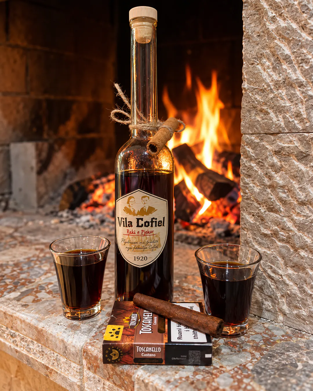 Vila Cofiel traditional Albanian raki served by the fireplace