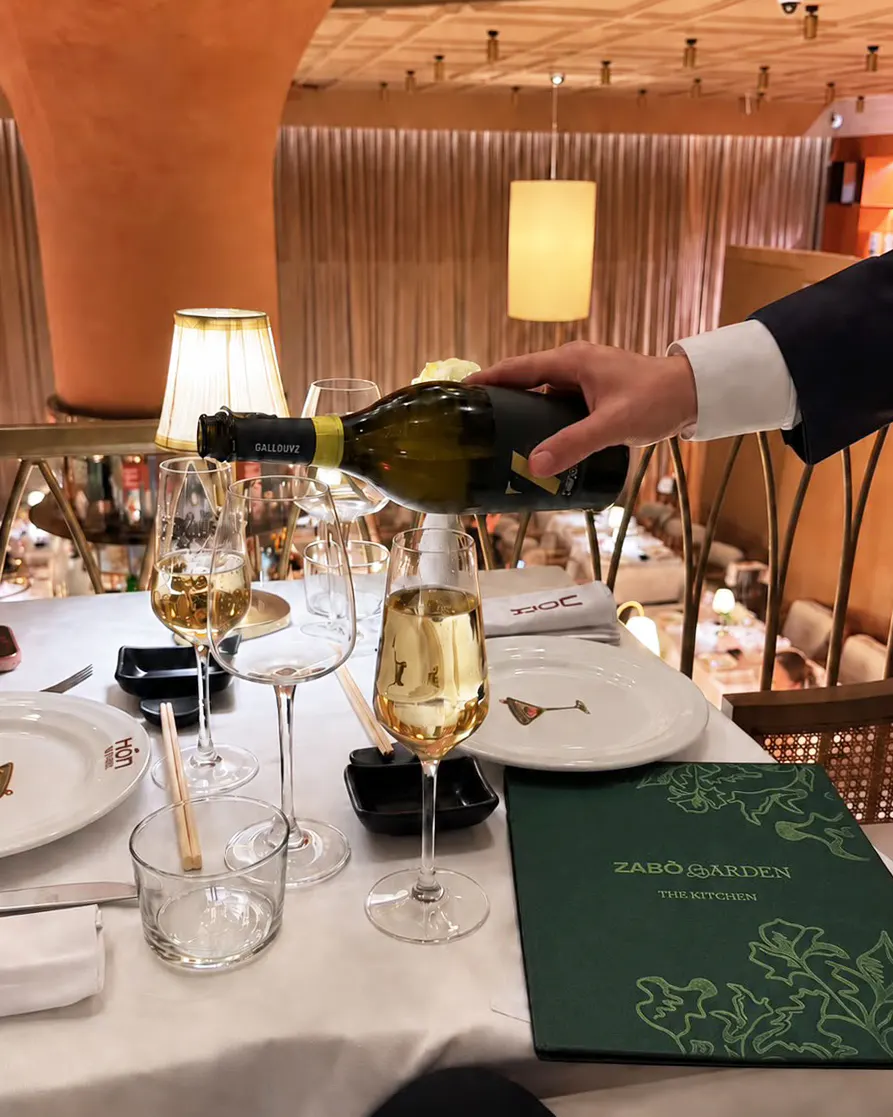 Wine service and elegant fine dining atmosphere at ZABO Garden in Tirana
