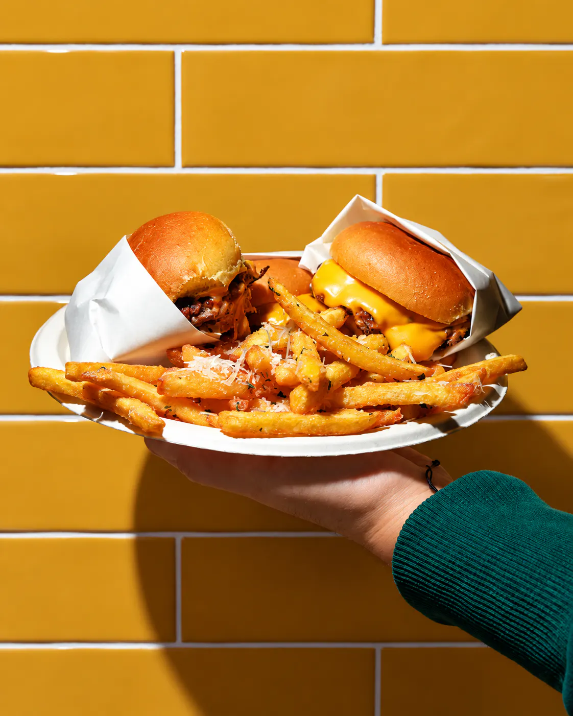 American-style mini cheeseburgers and crispy fries served at Brio’s in Tirana, Albania.